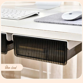 Self-adhesive slide-out under desk storage drawer for efficient organization.