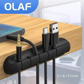 Silicone Cable Desk Organizer keeping cables tidy on a wooden desk.