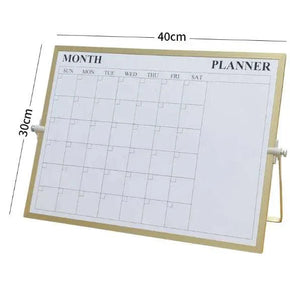 Magnetic desktop whiteboard with a monthly planner design in a sturdy stand, dimensions 40cm by 30cm, ideal for organizing notes and tasks.